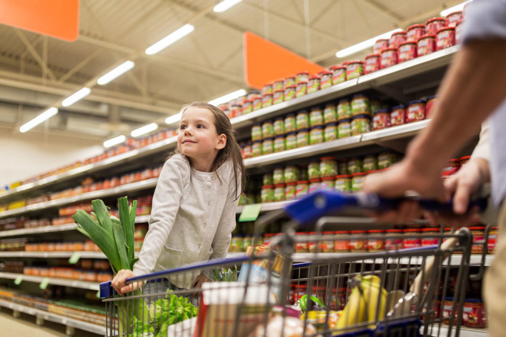 Child buying sugary drinks.